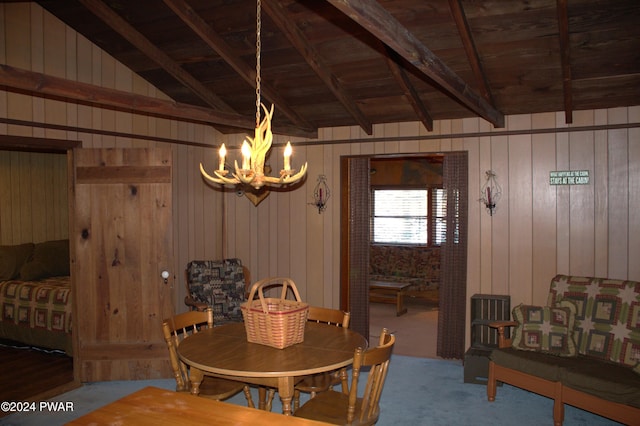 123 Mosier Rd, Dingmans Ferry, PA 18328 - dining space featuring vaulted ceiling with beams, wood ceiling, wooden walls, and an inviting chandelier