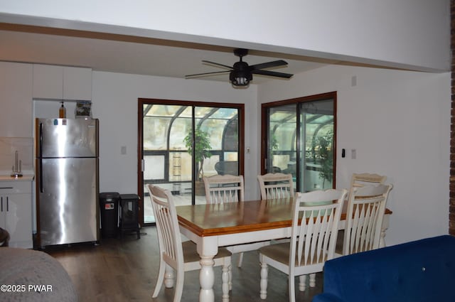 6372 Baltic Ave, Tobyhanna, PA 18466 - dining space featuring dark wood-style floors and a ceiling fan