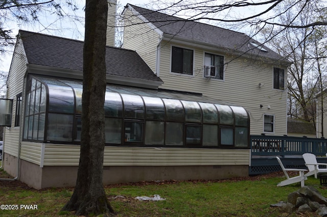 6372 Baltic Ave, Tobyhanna, PA 18466 - rear view of house with a sunroom, a shingled roof, crawl space, and a chimney