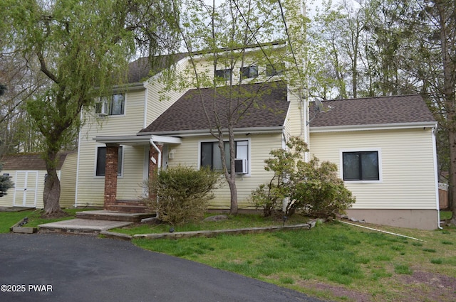 6372 Baltic Ave, Tobyhanna, PA 18466 - view of front of house featuring a shingled roof and a front yard