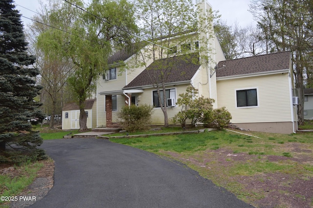 6372 Baltic Ave, Tobyhanna, PA 18466 - view of front of property with a chimney, roof with shingles, and cooling unit