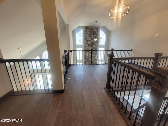 101 Maple Leaf Rd, Lackawaxen, PA 18435 - corridor with an upstairs landing, high vaulted ceiling, wood finished floors, and baseboards