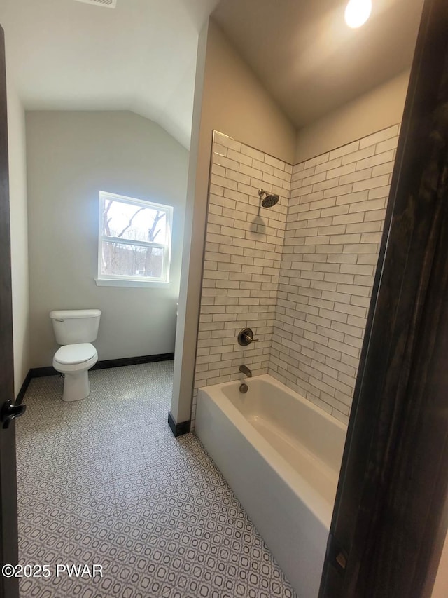 101 Maple Leaf Rd, Lackawaxen, PA 18435 - full bathroom with baseboards, washtub / shower combination, toilet, and lofted ceiling