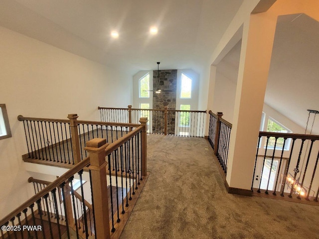 101 Maple Leaf Rd, Lackawaxen, PA 18435 - corridor featuring an upstairs landing, carpet, and vaulted ceiling