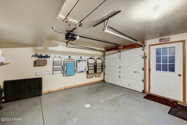 garage featuring a garage door opener