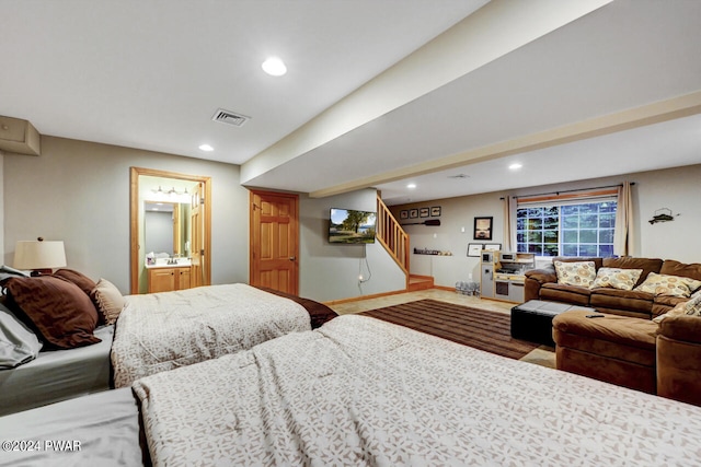 bedroom with ensuite bath