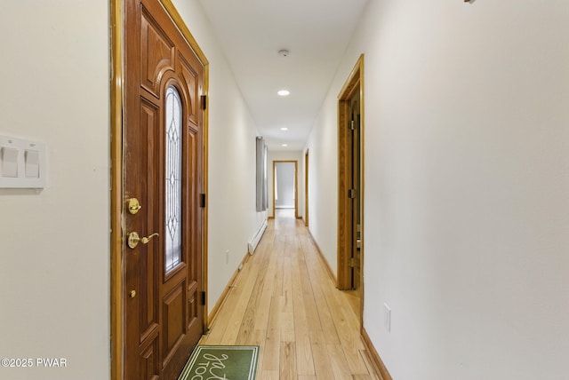 20 Chuck Foster Dr, Hawley, PA 18428 - corridor featuring a baseboard radiator, light wood-type flooring, recessed lighting, and baseboards