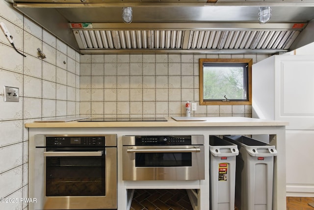 20 Chuck Foster Dr, Hawley, PA 18428 - kitchen featuring stainless steel oven, black electric stovetop, extractor fan, and light countertops