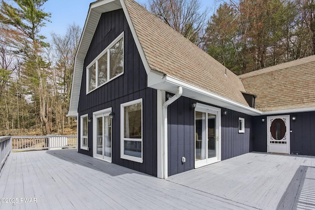 20 Chuck Foster Dr, Hawley, PA 18428 - back of house with a wooden deck, board and batten siding, and a shingled roof