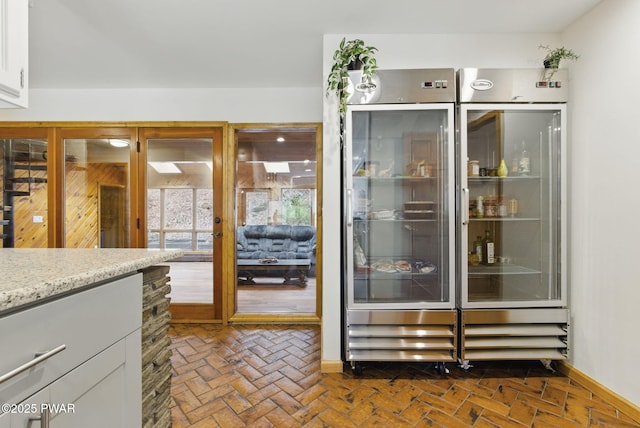 20 Chuck Foster Dr, Hawley, PA 18428 - interior space with brick floors, built in fridge, and baseboards