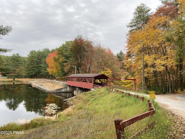20 Chuck Foster Dr, Hawley, PA 18428 - dock area with a wooded view and a water view