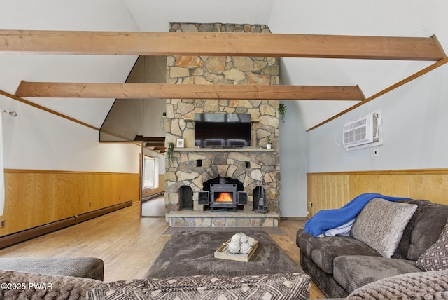 20 Chuck Foster Dr, Hawley, PA 18428 - living room with a wall mounted air conditioner, a wainscoted wall, wood finished floors, a fireplace, and wood walls
