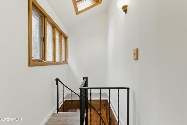 20 Chuck Foster Dr, Hawley, PA 18428 - stairway featuring wood finished floors, baseboards, and vaulted ceiling