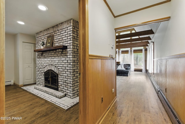 20 Chuck Foster Dr, Hawley, PA 18428 - hall featuring a baseboard heating unit, wood finished floors, wainscoting, recessed lighting, and ornamental molding