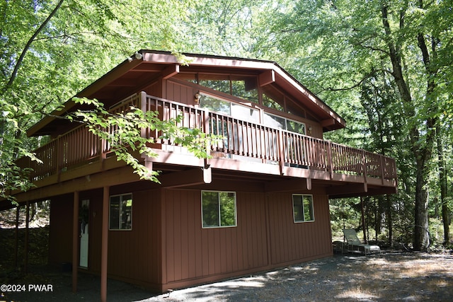 view of home's exterior featuring a deck