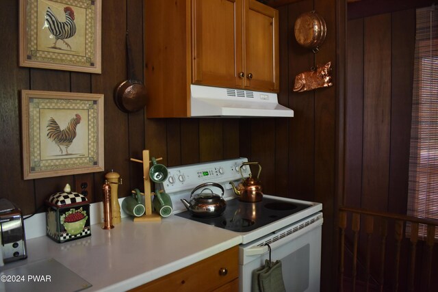 kitchen featuring white electric stove