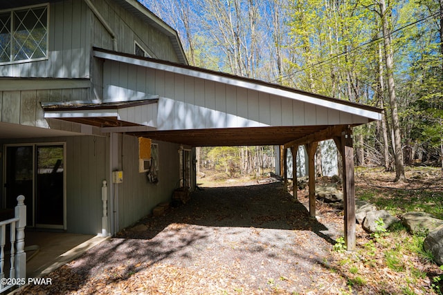view of parking featuring a carport