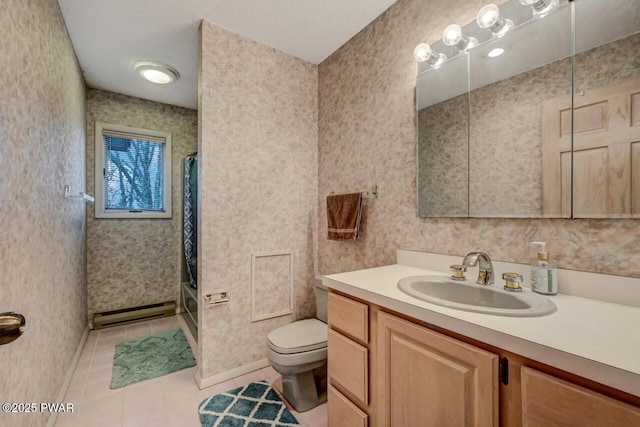 full bathroom featuring tile patterned flooring, vanity, a baseboard radiator, toilet, and shower / bath combo with shower curtain