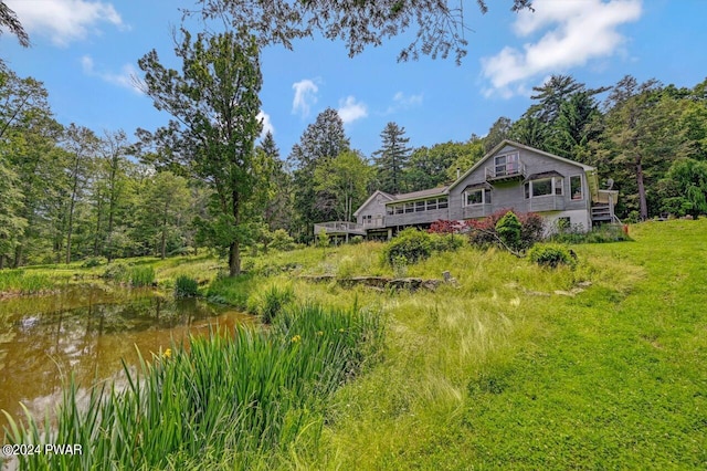 exterior space with a water view