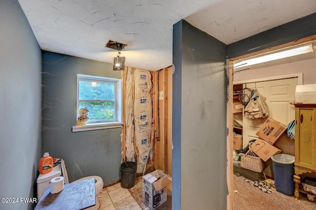 bathroom with tile patterned flooring