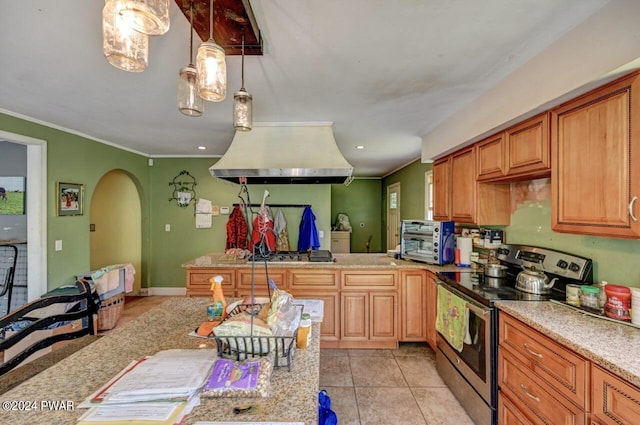 kitchen with stainless steel appliances, light stone counters, extractor fan, decorative light fixtures, and light tile patterned flooring