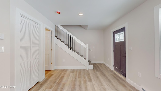 entryway with light wood-type flooring