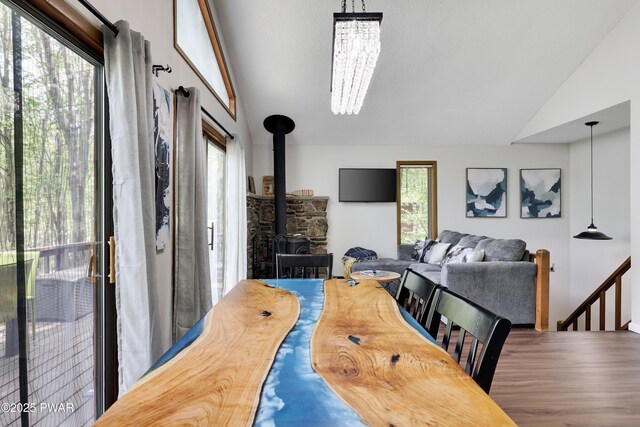 2894 S Fairway Dr, Lake Ariel, PA 18436 - dining space featuring a wood stove and lofted ceiling