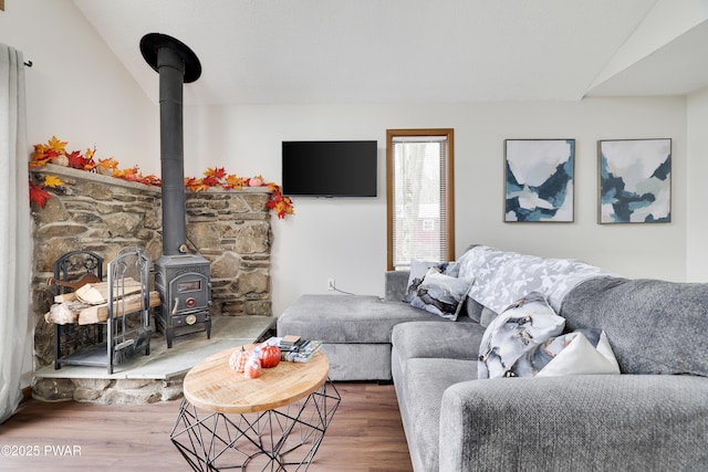 2894 S Fairway Dr, Lake Ariel, PA 18436 - living area featuring lofted ceiling, a wood stove, and wood finished floors