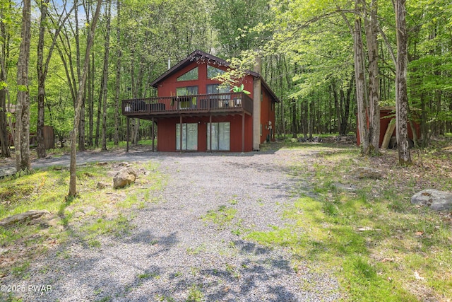 2894 S Fairway Dr, Lake Ariel, PA 18436 - rustic home featuring a deck and a view of trees