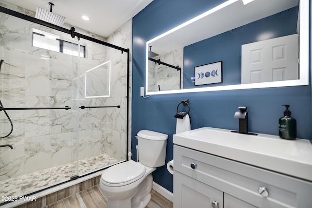 2894 S Fairway Dr, Lake Ariel, PA 18436 - bathroom with a marble finish shower, vanity, toilet, and wood finished floors