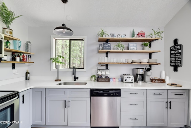 2894 S Fairway Dr, Lake Ariel, PA 18436 - bar featuring hanging light fixtures, a textured ceiling, appliances with stainless steel finishes, and a sink