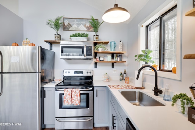 2894 S Fairway Dr, Lake Ariel, PA 18436 - kitchen with a sink, open shelves, pendant lighting, light countertops, and appliances with stainless steel finishes