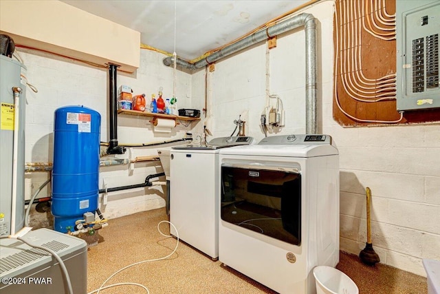 laundry room with independent washer and dryer and electric panel