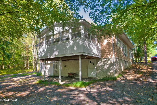 view of property exterior featuring a garage