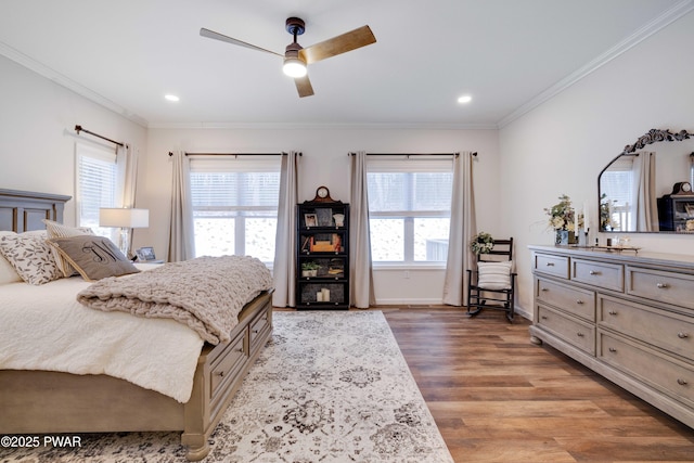 bedroom featuring crown molding, recessed lighting, light wood-style floors, ceiling fan, and baseboards