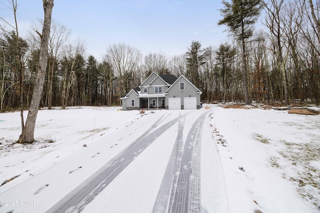 traditional-style home featuring a detached garage