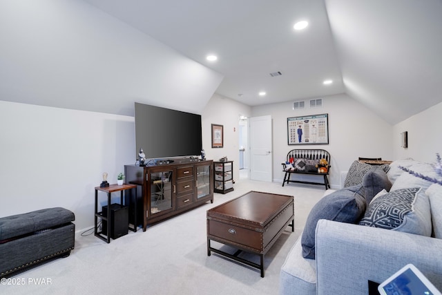 carpeted living area featuring recessed lighting, visible vents, and vaulted ceiling