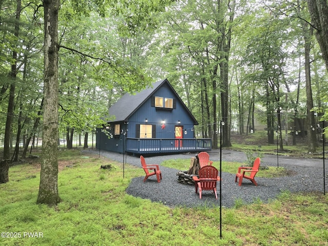 116 Pine Knob Cir, Hawley, PA 18428 - exterior space featuring an outdoor fire pit and a wooden deck