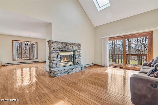 105 Beechwood Ln, Greentown, PA 18426 - living room with a chandelier, hardwood / wood-style flooring, and baseboard heating