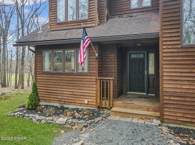 105 Beechwood Ln, Greentown, PA 18426 - entrance to property featuring a chimney and roof with shingles