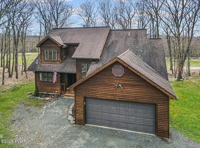 105 Beechwood Ln, Greentown, PA 18426 - view of front of house featuring a garage, a front lawn, and a shingled roof