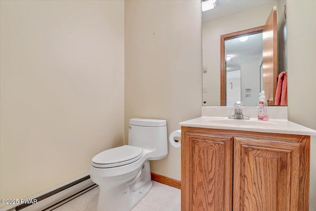 105 Beechwood Ln, Greentown, PA 18426 - half bath featuring toilet, a baseboard radiator, vanity, and baseboards