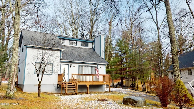 rear view of house with a deck