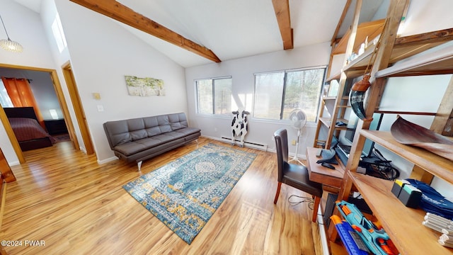 office with vaulted ceiling with beams, baseboard heating, and light hardwood / wood-style flooring