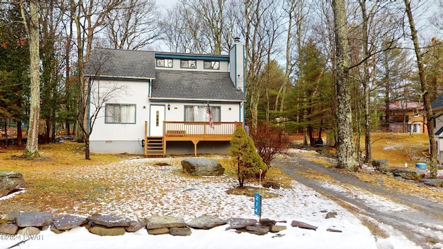 view of front of home featuring a wooden deck