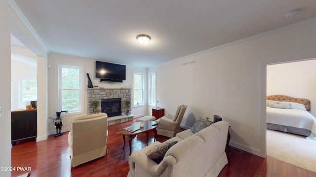 living room with a fireplace, dark hardwood / wood-style floors, and ornamental molding