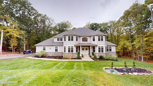 view of front of home with a front yard