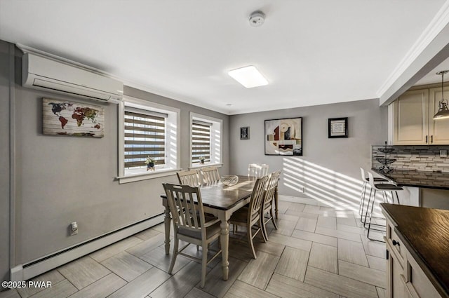 dining space with light parquet floors, crown molding, a baseboard heating unit, and a wall unit AC