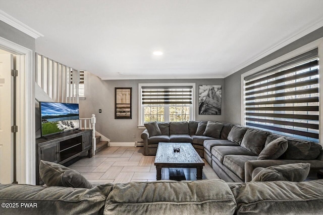 living room featuring ornamental molding, light parquet flooring, and a baseboard heating unit