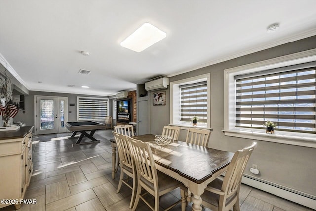 dining area featuring french doors, a baseboard radiator, ornamental molding, a wall unit AC, and dark parquet floors